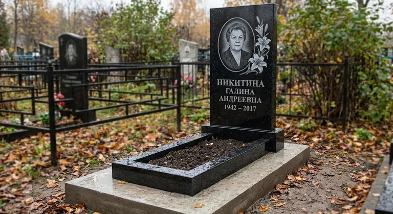 Памятник с гравировкой лилий — выполненная работа «Никитина» в Челябинске