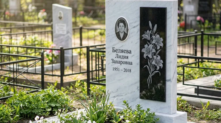Памятник с гравировкой лилий — выполненная работа «Беляева» в Челябинске