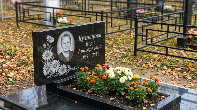 Памятник с гравировкой ромашек — выполненная работа «Кузнецова» в Челябинске