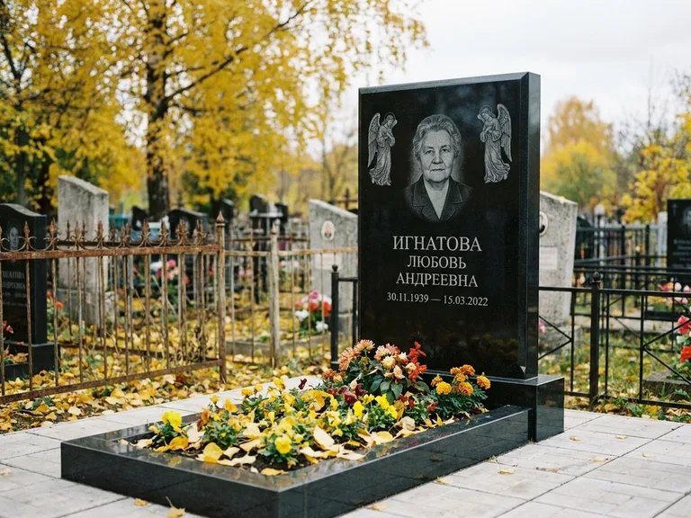 Памятник с гравировкой ангела — гравировка двух ангелов по сторонам портрета, работа «Игнатова» в Челябинске