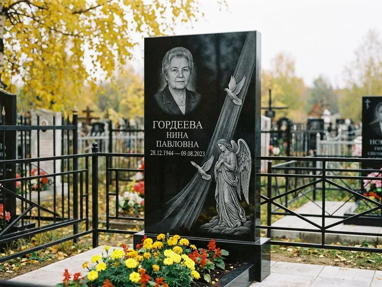 Памятник с гравировкой ангела — гравировка ангела с голубем по диагонали стелы, работа «Гордеева» в Челябинске